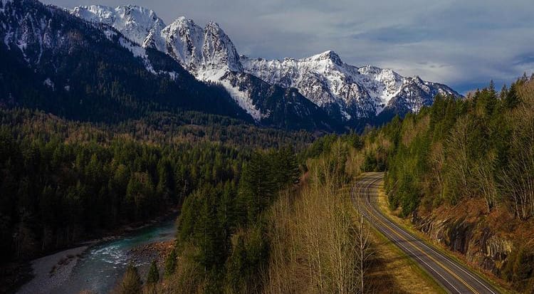 Mountain views along the river from Cascade Loop Scenic Highway