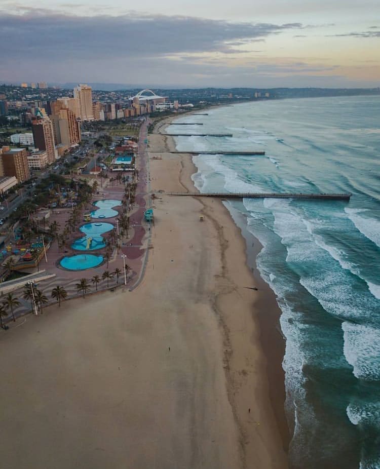 Evening falls over the endless stretch of coastline at the Durban seafront