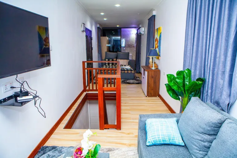 The cosy interior of one of the shipping container homes made by Gyimah’s enterprise