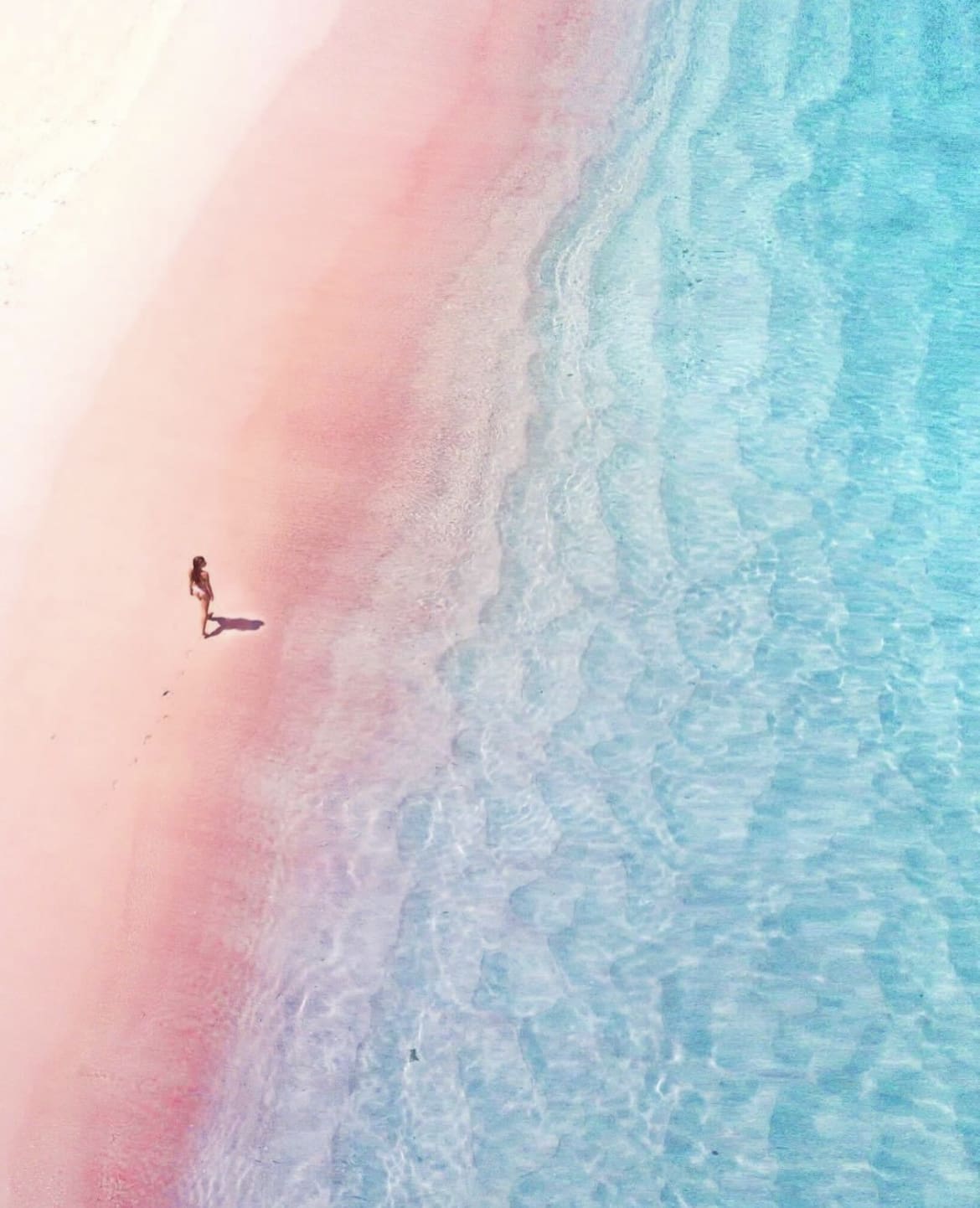 Walking along the sand at Pantai Merah Muda, Lombok