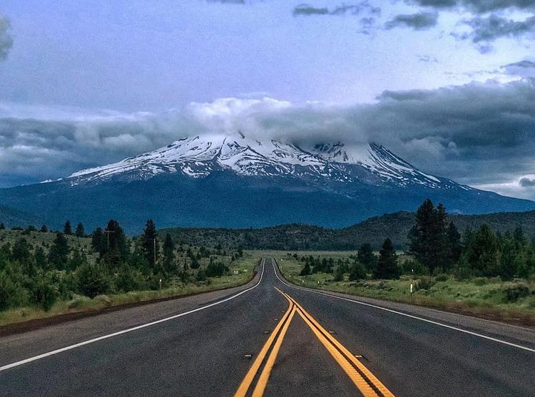 Snow capped mountains on the Volcanic Legacy Scenic Byway