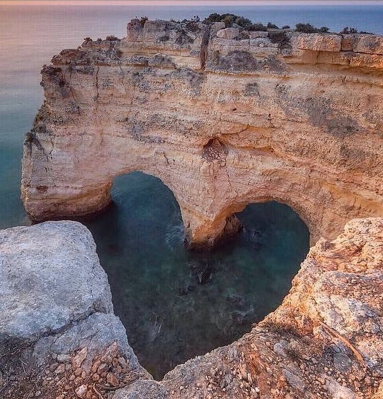The heart shape rock at Praia de Marinha  - The 10 Most Beautiful Beaches In Portugal