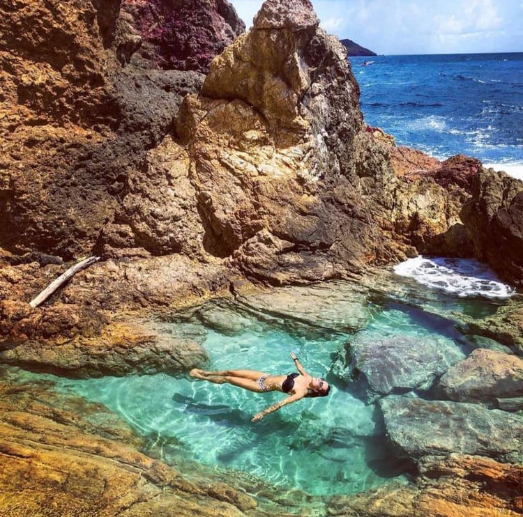 Floating in a rock pool