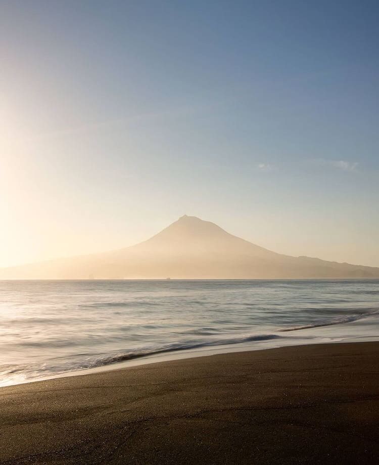 The sun rising over Praia do Almoxarife, Azores