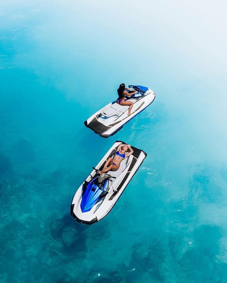 Girls in bikinis jetskiing in the carribean - The 15 Best Islands In The Caribbean