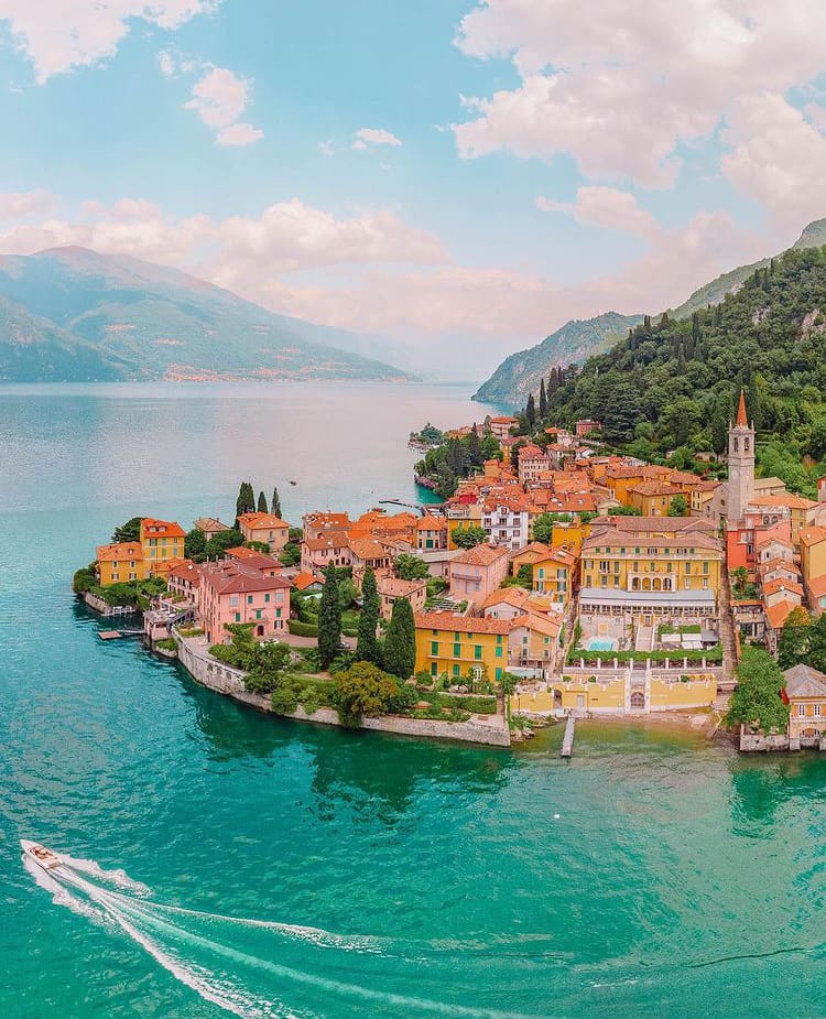 Speed boat cruised past luxury homes in Lake Como, Italy