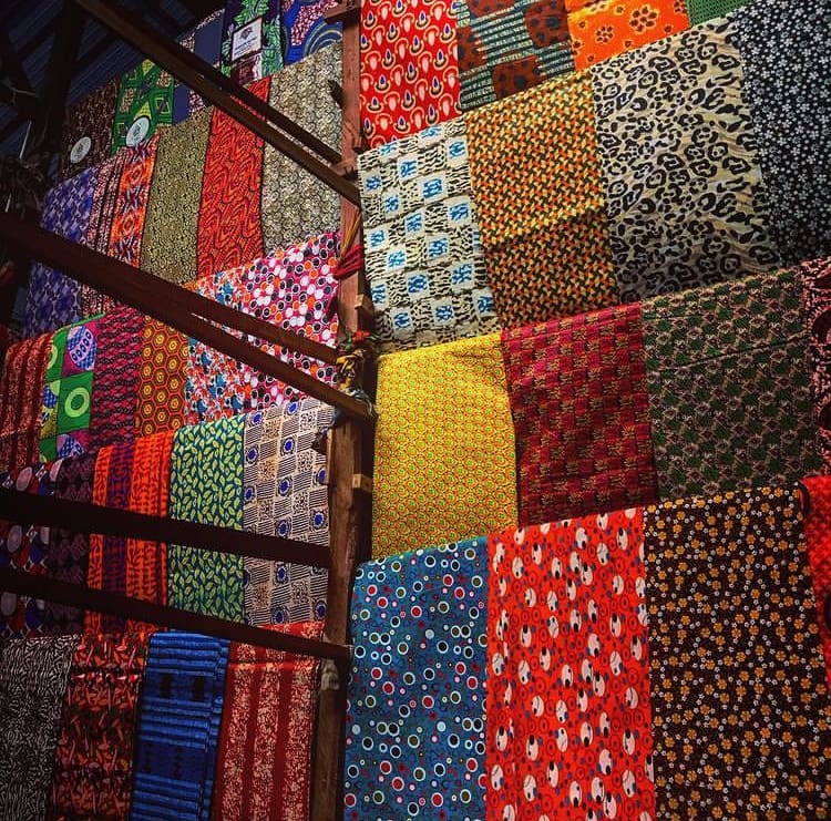 Brightly coloured fabrics for sale at Kimironko Market