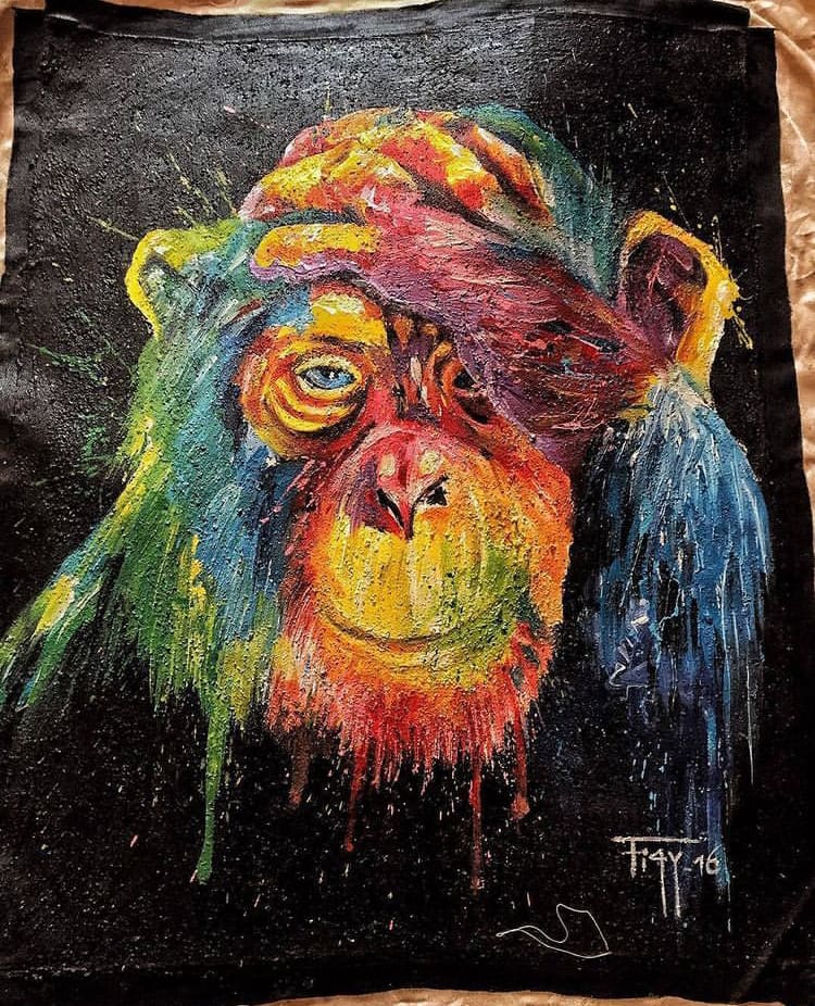 Colourful chimpanzee painting at Niyo Art Gallery