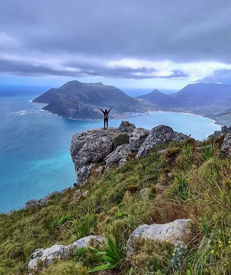 Hikers enjoying a misty morning view from Chapman's Peak