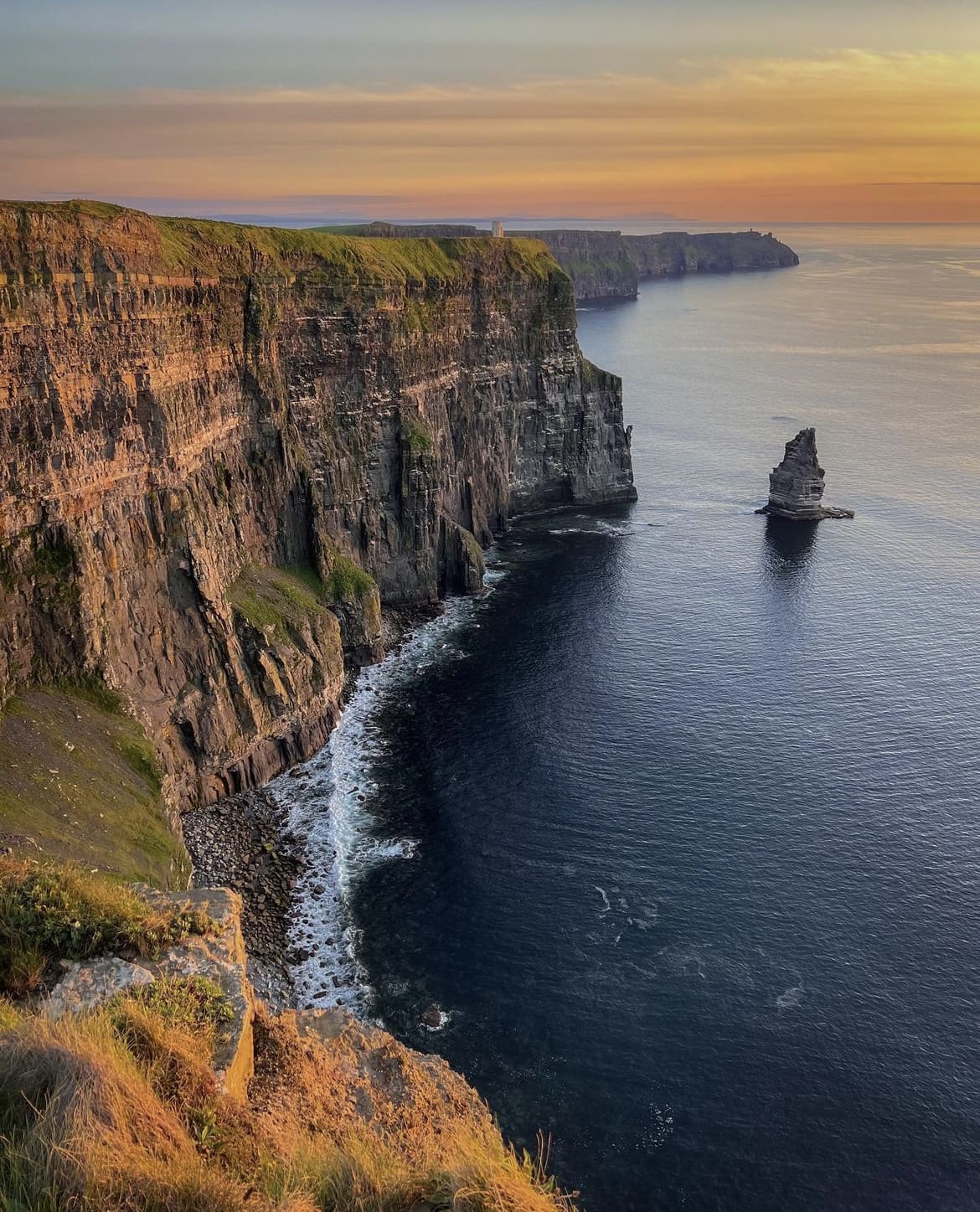 Picturesque sunset over the cliffs of moher and atlantic ocean - The 22 Best Things to do in Ireland