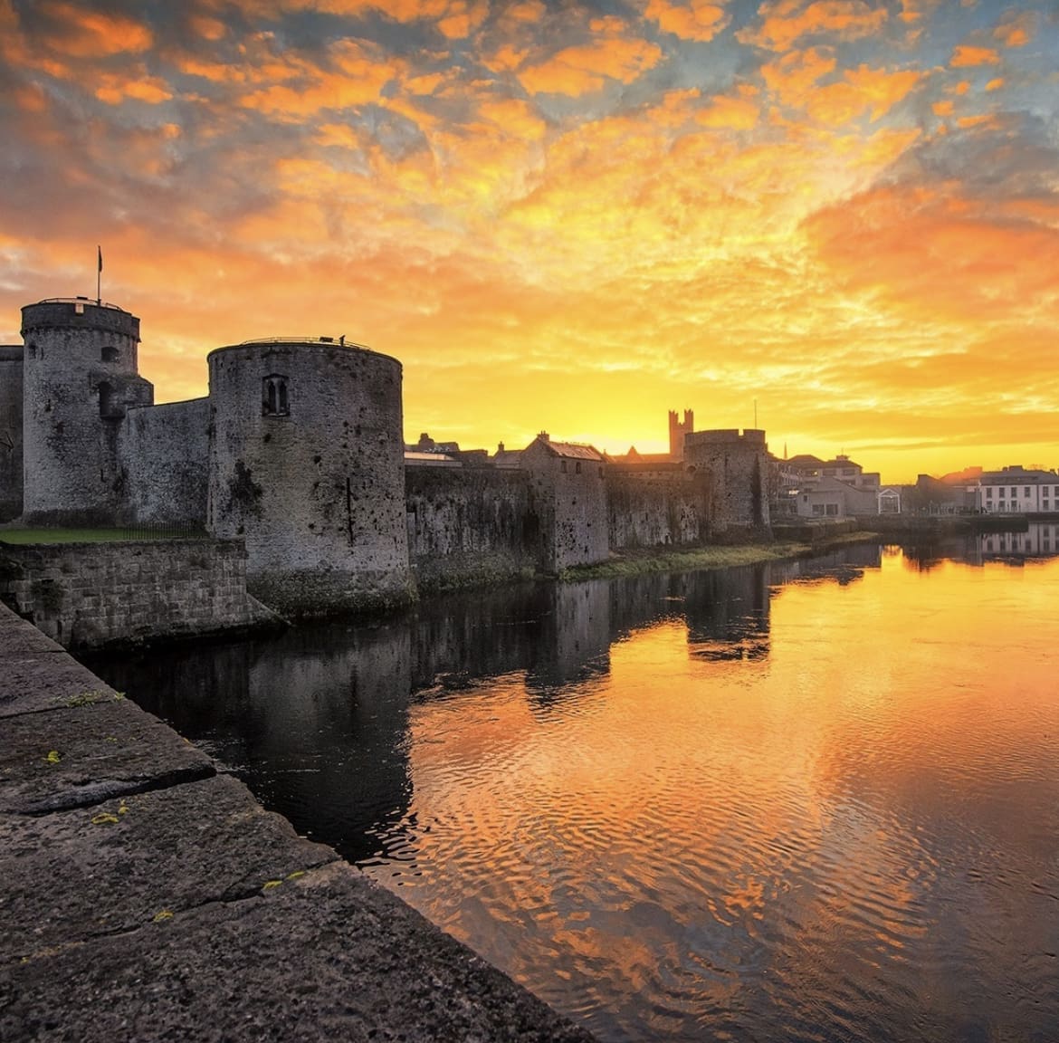 A winter sunrise over King John's Castle