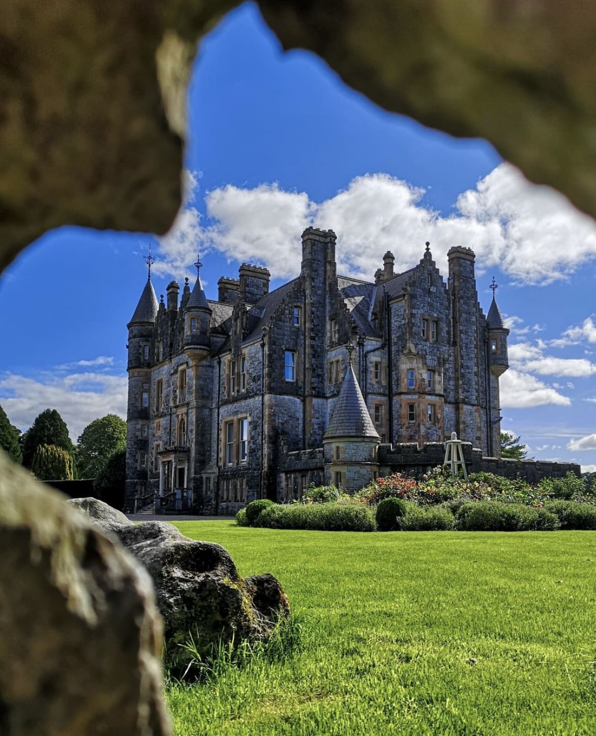 Blarney Castle surrounded by a halo of clouds - The 22 Best Things to do in Ireland