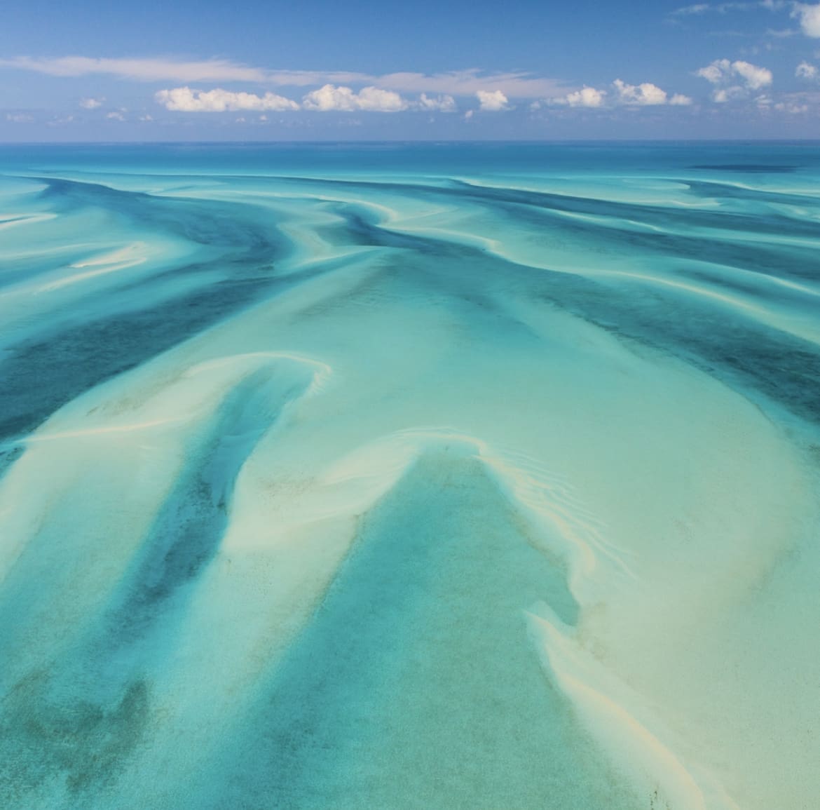 Views of the Schooner Cays and it's crystal blue waters from above