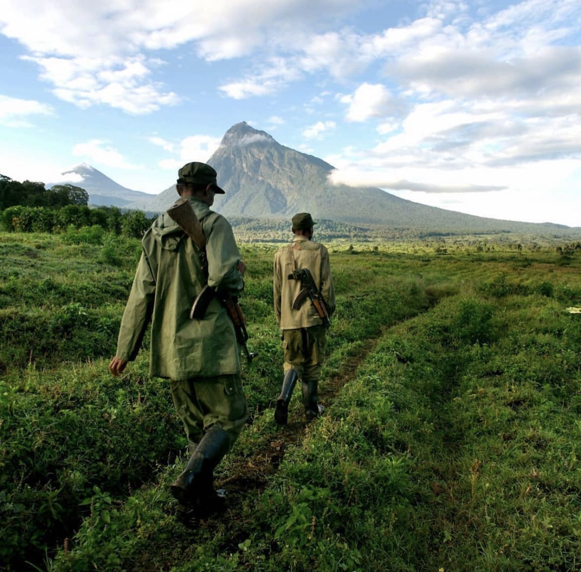 Armed guides trekking in Virunga